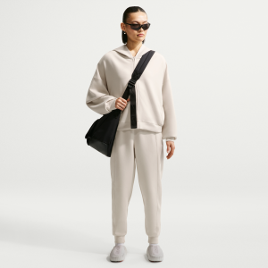 Nike Nike Women's 24.7 ImpossiblySoft Dri-FIT Mid-Rise Jogger Pants in Brown | HQ8184-104 - $80.97 at Nike