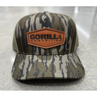 Gorilla Ammunition Leather Patch Trucker Hat - Mossy Oak Bottomland Camo